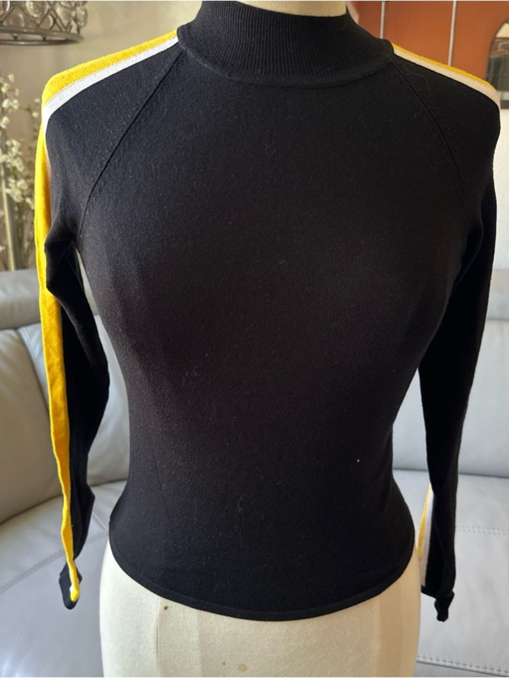 Divided Black Mock Neck Long Sleeve Top with Yellow and White Shoulder Stripes